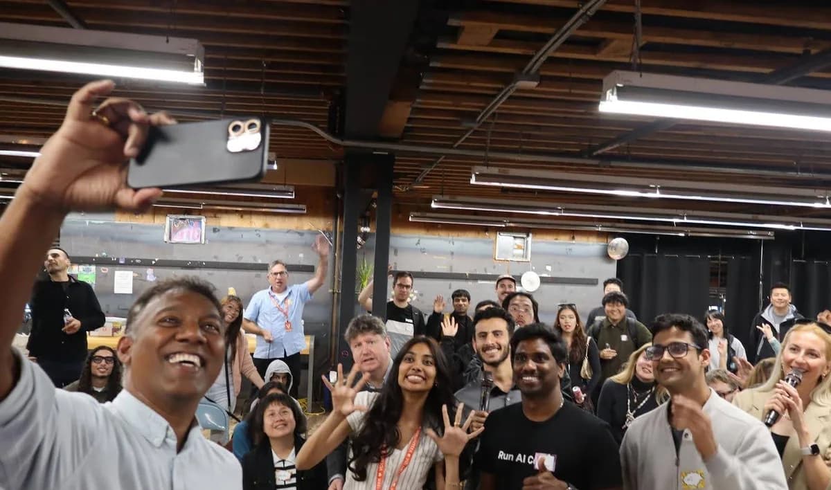 People sharing a lively moment at a prior professional gathering