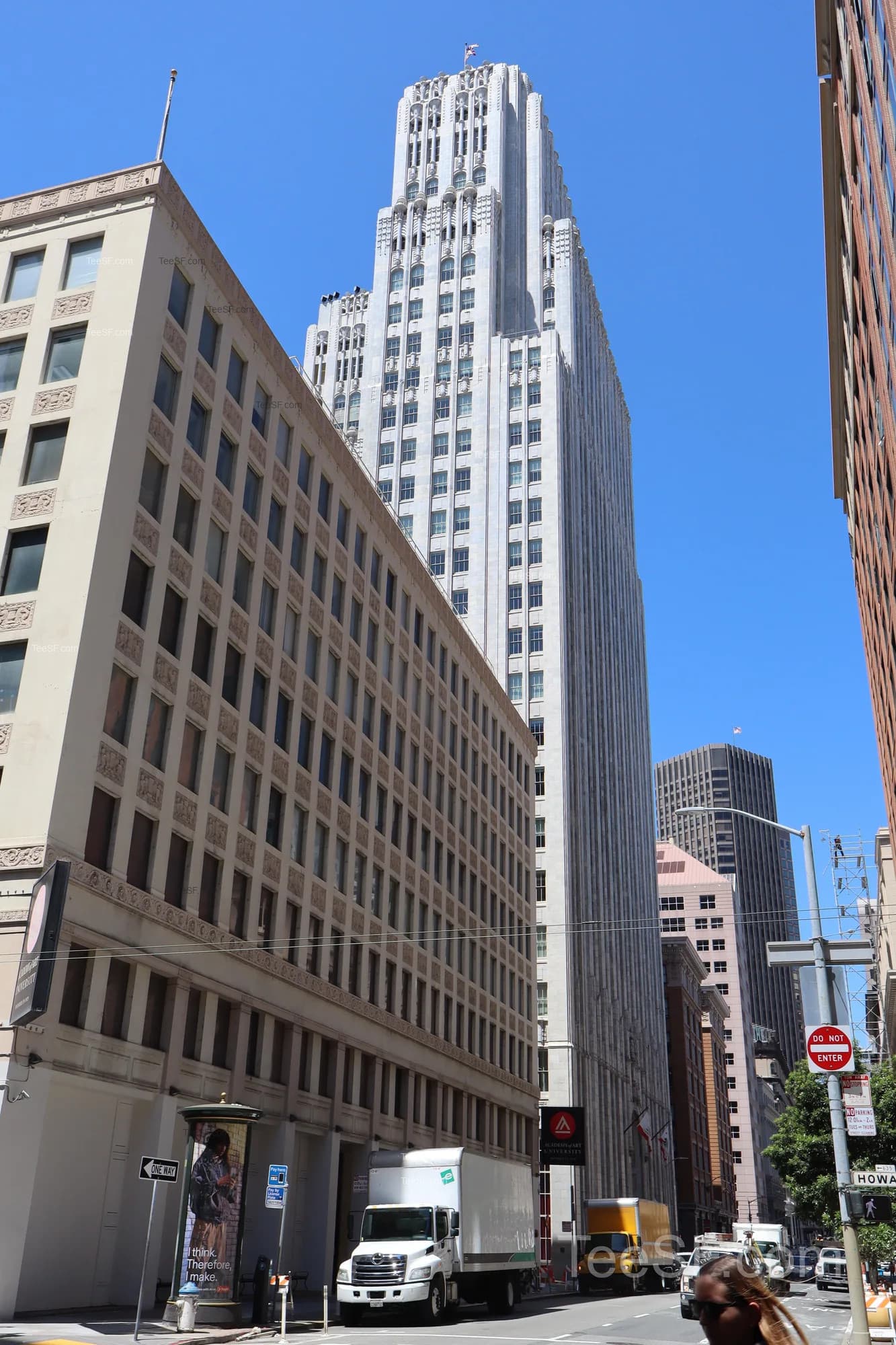 Downtown San Francisco architecture rising above a busy street